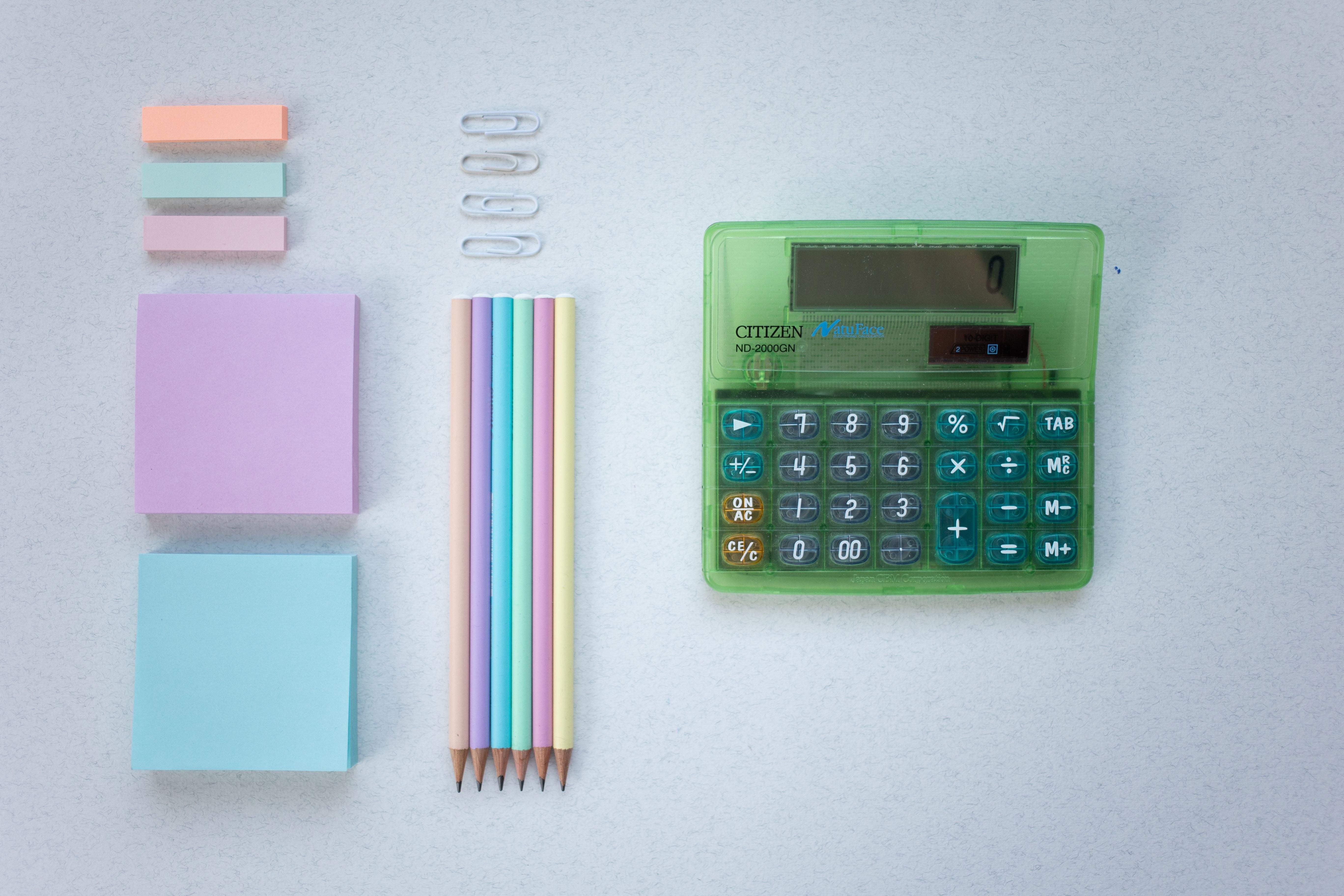 Photo of office supplies, including a calculator
